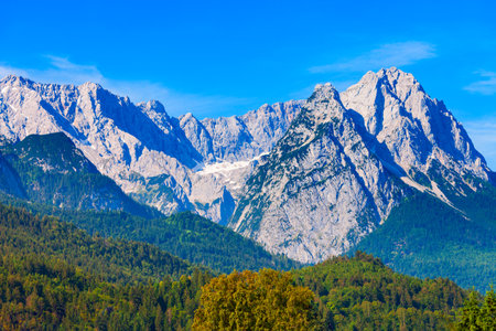 Zugspitze Alps mountain panoramic view from Garmisch-partenkirchen town in Bavaria, southern Germanyの写真素材