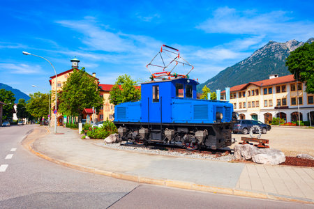 Old cog train near the Rathaus or Town Hall in Garmisch-partenkirchen or Garmisch Partenkirchen, an Alpine town in Bavaria, southern Germanyの写真素材