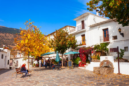 Capileira, Spain - October 21, 2021: Fountain at Plaza Calvario square in Capileira village in the Alpujarras area in the province of Granada in Andalusia, Spain.のeditorial素材