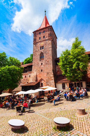 Nuremberg, Germany - July 10, 2021: Tiergartnertorturm tower at Tiergartnertorplatz square in Nuremberg old town. Nuremberg is the second largest city of Bavaria state in Germany.のeditorial素材