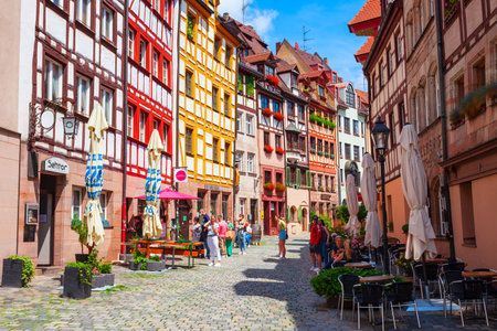 Nuremberg, Germany - July 10, 2021: Weissgerbergasse street with colorful timber frame or fachwerk houses in Nuremberg old town. Nuremberg is the second largest city of Bavaria.のeditorial素材