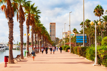 Alicante, Spain - October 18, 2021: Promenade at the port of Alicante. Alicante is a city in the Valencia region, Spain.のeditorial素材