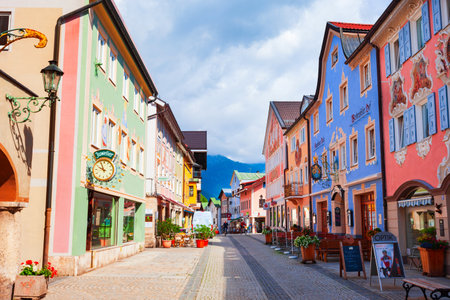 Garmisch-Partenkirchen, Germany - July 02, 2021: Beauty houses with Luftlmalerei, bayern facade painting art at Ludwigstrasse, a historic street in Garmisch Partenkirchen town, Bavariaのeditorial素材