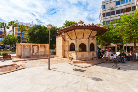 Heraklion, Greece - October 13, 2021: The ancient venetian Bembo Fountain and Turkish Sebil at Kornarou Square in Heraklion city on Crete island, Greeceのeditorial素材