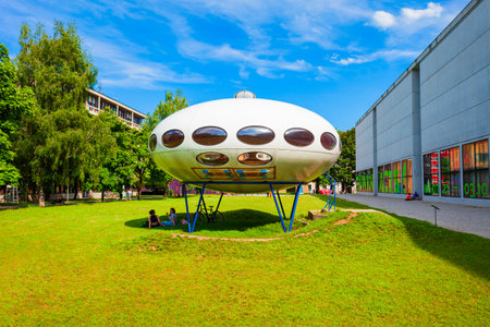 Munich, Germany - July 06, 2021: Futuro House or Futuro Pod is a round house located neat the Pinakothek der Moderne, a modern art museum in Munichのeditorial素材