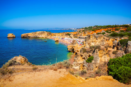 Sao Rafael beach with beauty limestone cliff aerial view, Albufeira city in Algarve region, Portugalの写真素材