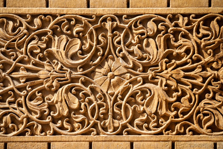 Rajasthani floral style haveli carving pattern in old building in Jaislamer city in Rajasthan state of Indiaの写真素材