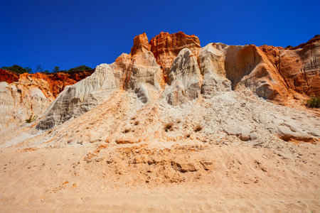 Falesia beach with beauty limestone cliff in Albufeira city, Algarve region in Portugalの写真素材