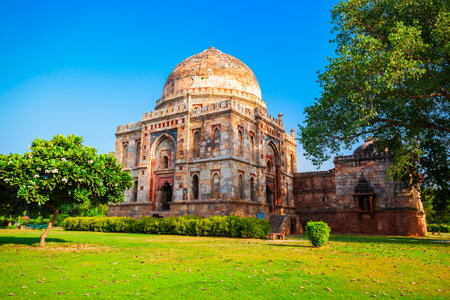 Bara Gumbad Mosque and tomb at the Lodi Gardens or Lodhi Gardens, a city park situated in New Delhi city in Indiaの写真素材