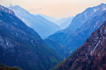 Scenic mountain valley landscape in Everest or Khumbu region in Himalaya in Nepal at sunsetの写真素材