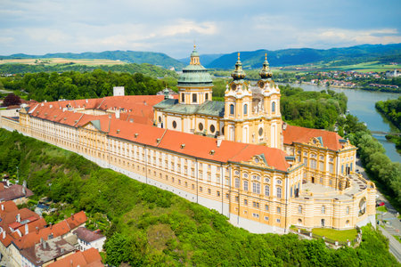 Melk Abbey Monastery aerial panoramic view. Stift Melk is a Benedictine abbey in Melk, Austria. Monastery located on a rocky outcrop overlooking the Danube river and Wachau valley.の写真素材