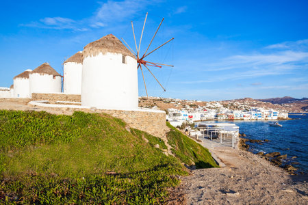 The Mykonos windmills are iconic feature of the Greek island of the Mykonos. The island is one of the Cyclades islands in the Aegean Sea, Greece.の写真素材