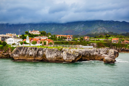 Llanes Port lighthouse and city aerial view. Llanes is a municipality of the Asturias province in northern Spain.の写真素材