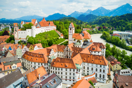 Hohes Schloss Fussen or Gothic High Castle of the Bishops and St. Mang Abbey monastery aerial panoramic view in Fussen, Germanyの写真素材