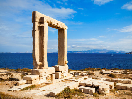Naxos Portara or Apollo Temple entrance gate on Palatia island near Naxos island in Greeceの写真素材