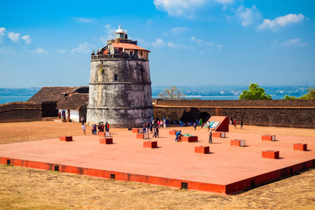 Fort Aguada and its lighthouse is a portuguese fort standing on Sinquerim Beach in Goa, Indiaの写真素材