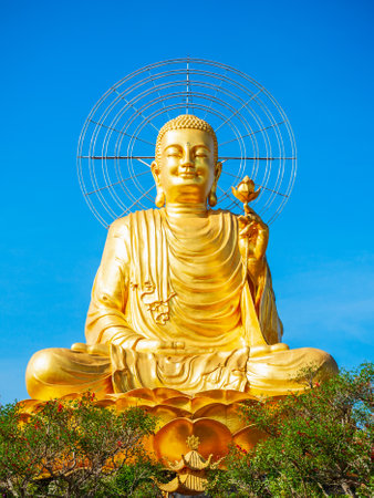 The Golden Buddha statue or Thien vien Van Hanh in Dalat city in Vietnamの写真素材