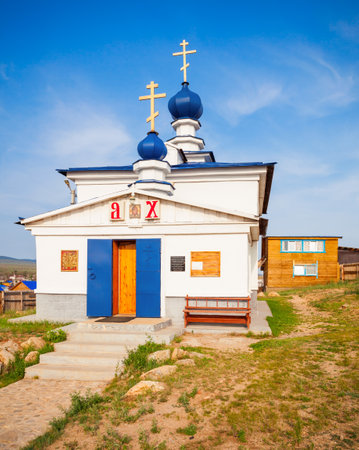Church of Our Lady Derzhavnaya in Khuzhir village at Olkhon island in Siberia, Russia. Khuzhir is a village situated near the Baikal lake.の写真素材