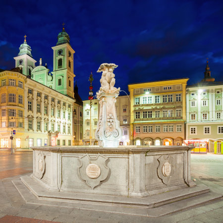 Hauptplatz or main square in the centre of Linz in Austria at sunset. Linz is the third largest city of Austria.の写真素材