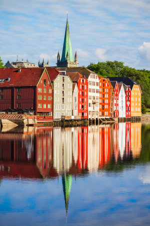 Colorful old houses at the Nidelva river embankment in the center of Trondheim old town, Norwayの写真素材