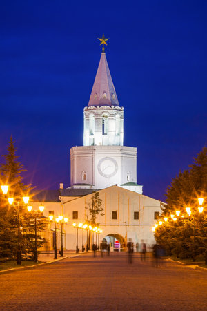The Spasskaya or Saviors Tower at night, Kazan Kremlin in Russia at night. Spasskaya Tower serves as Kremlin main entrance.の写真素材