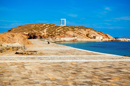 Naxos Portara or Apollo Temple entrance gate on Palatia island near Naxos island in Greeceの写真素材