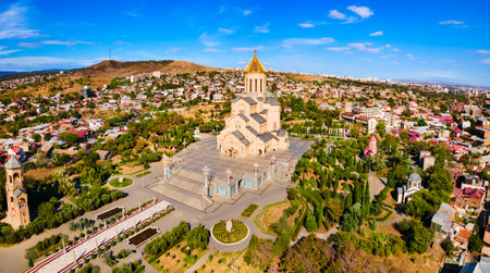 Holy Trinity Cathedral or Tsminda Sameba Church aerial panoramic view in Tbilisi old town. Tbilisi...