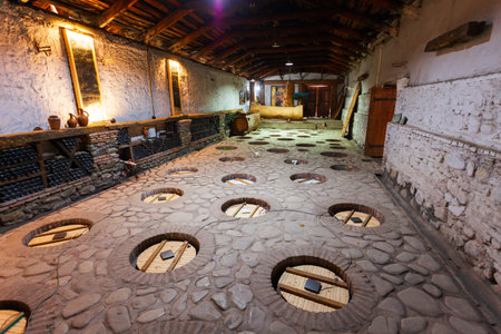 Kvareli, Georgia - September 03, 2021: Kindzmarauli Corporation Winery cellar with kvevri pots in Kvareli, Kakheti. Kakheti is a region in eastern Georgia with Telavi as its capital.のeditorial素材