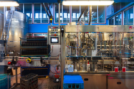 Kvareli, Georgia - September 03, 2021: Bottling line at Kindzmarauli Corporation Winery in Kvareli, Kakheti. Kakheti is a region in eastern Georgia with Telavi as its capital.のeditorial素材