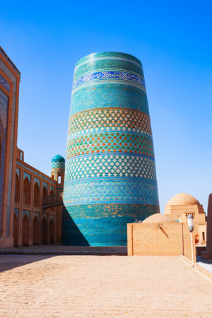 Kalta Minor Minaret at the Itchan Kala, the walled inner town of the city of Khiva in Uzbekistanの写真素材