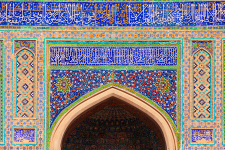 Registan mosaic pattern design background of ceramic tiles of Registan madrasah in Samarkand city, Uzbekistanの写真素材