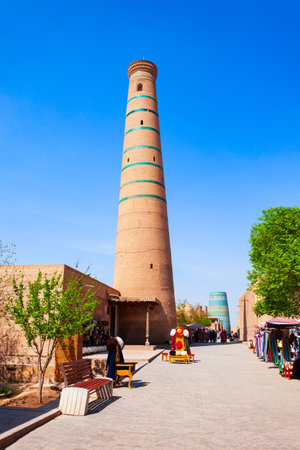 Juma Masjid and Minaret at the Ichan Kala, an ancient walled inner town of the city of Khiva in Uzbekistanの写真素材