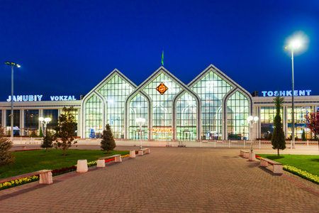 Tashkent, Uzbekistan - April 12, 2021: Yuzhny Vokzal is the main passenger railway station in Tashkent city, Uzbekistan at nightのeditorial素材