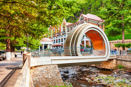 Borjomi, Georgia - September 01, 2021: Twirl Bridge or Mobius Loop Bridge through Borjomula river in Borjomi town. Borjomi is a resort town in Samtskhe Javakheti region of Georgia.のeditorial素材