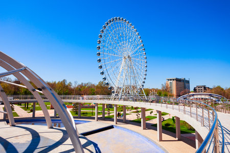 Tashkent, Uzbekistan - April 11, 2021: Ferris wheel at the Park Navruz or Navroz Bogi, an ethnographic park in Tashkent city, Uzbekistanのeditorial素材