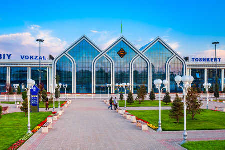 Tashkent, Uzbekistan - April 12, 2021: Yuzhny Vokzal is the main passenger railway station in Tashkent city, Uzbekistan at sunsetのeditorial素材