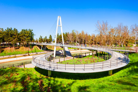 Tashkent, Uzbekistan - April 11, 2021: Road of Thought Bridge or Infinity Bridge is a cable stayed bridge through Anchor canal in Tashkent city, Uzbekistanのeditorial素材