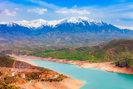 Pamir Mountains, view from the Hisorak water reservoir near Shahrisabz city in Uzbekistanの写真素材
