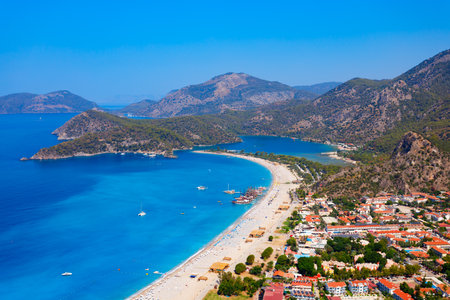 Oludeniz beach aerial panoramic view. Oludeniz or Blue Lagoon is a beach resort in the Fethiye district of Mugla Province, Turkey.の写真素材