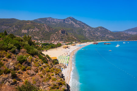Oludeniz beach aerial panoramic view. Oludeniz or Blue Lagoon is a beach resort in the Fethiye district of Mugla Province, Turkey.の写真素材