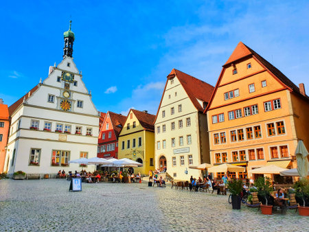 Rothenburg ob der Tauber, Germany - July 11, 2021: Colorful houses at the Market Square or Marktplatz in Rothenburg ob der Tauber old town in the Franconia region of Bavaria, Germany.のeditorial素材