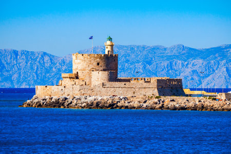 Saint Nicholas Fort guards the Mandraki harbour in Rhodes city, capital of Rhodes island in Greeceの写真素材