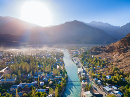 Khorog city, Ghunt river and Pamir mountains aerial panoramic view. Khorog is situated along the Pamir Highway in Gorno-Badakhshan, Tajikistan.の写真素材
