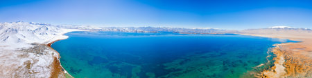 Karakul lake aerial panoramic view. Karakul or Qarokul lake is located in the Pamir Mountains near Murghab town in Tajikistan.の写真素材