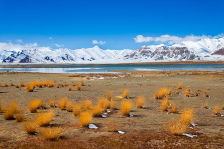 Shorkul lake and Pamir mountains landscape. Shorkul or Shurkul lake is located near the Pamir Highway and Murghab town in Tajikistan.の写真素材