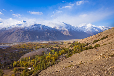 The Wakhan Corridor mountain landscape view from the Pamir highway near Langar village. Wakhan Corridor is located on the border between Tajikistan and Afghanistan.の写真素材