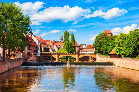 Maxbrucke or Maxbruecke is an arch bridge over the Pegnitz river in the old town of Nuremberg. Nuremberg is the second largest city of Bavaria state in Germany.の写真素材