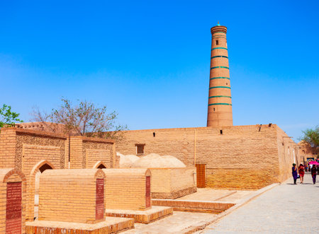 Juma Masjid and Minaret at the Ichan Kala, an ancient walled inner town of the city of Khiva in Uzbekistanの写真素材