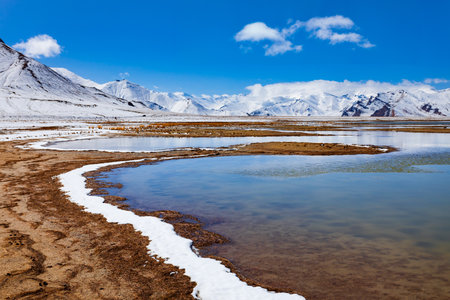 Shorkul lake and Pamir mountains landscape. Shorkul or Shurkul lake is located near the Pamir Highway and Murghab town in Tajikistan.の写真素材