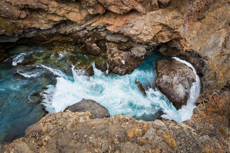 Iskanderkul Waterfall or Fann Niagara is located near the Iskanderkul lake in the Fann Mountains in Sughd Province of Tajikistanの写真素材